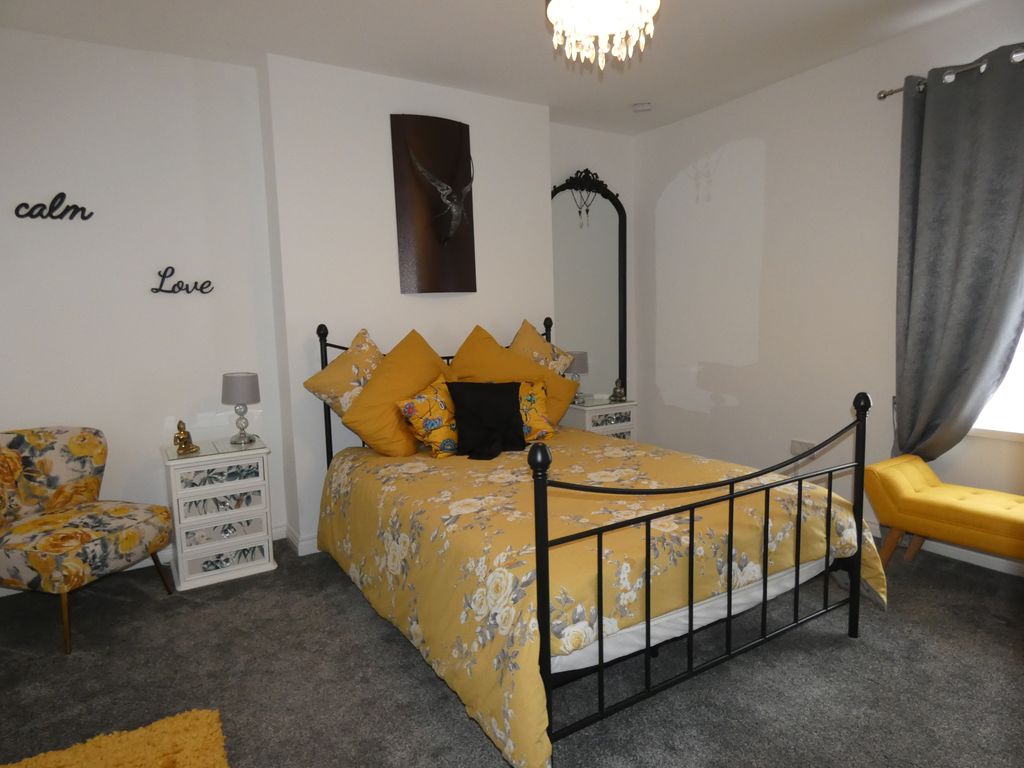 Bedroom One- click for photo gallery